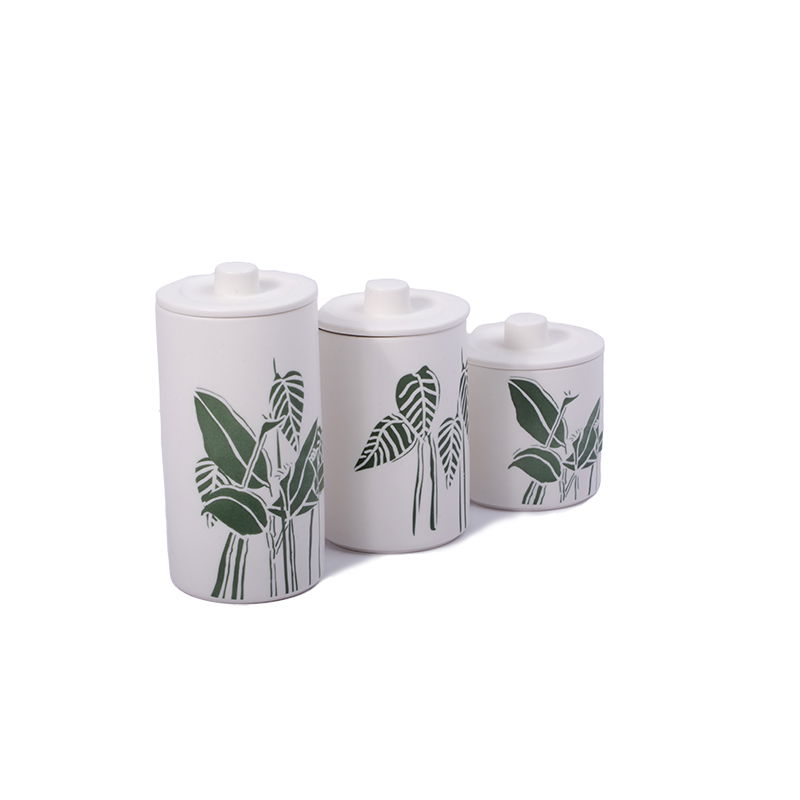 A set of 3-piece porcelain spice jars with a lid